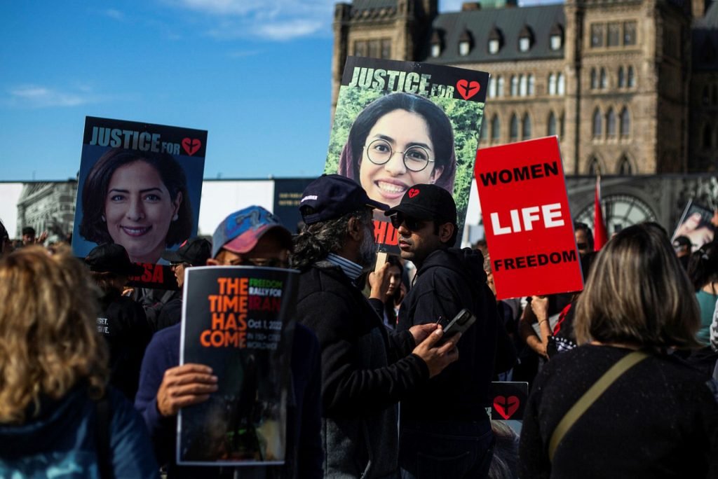  Hundreds gathered on Parliament Hill on Oct. 4, 2022, to show solidarity with the Women Life Freedom movement.  The Hill Times photograph by Andrew Meade.  