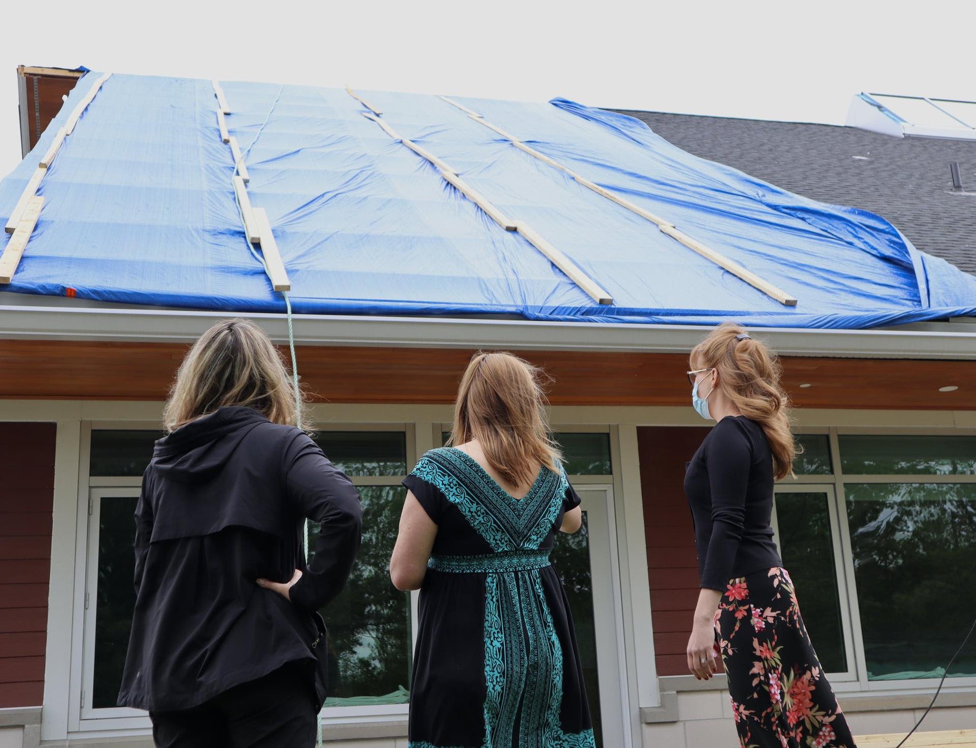   Pictured: Surveying storm damage at the Ruddy Shenkman Hospice Centre in Kanata. Thank you to all of the volunteers who sprung into action to clear fallen trees and repair the building's roof.  